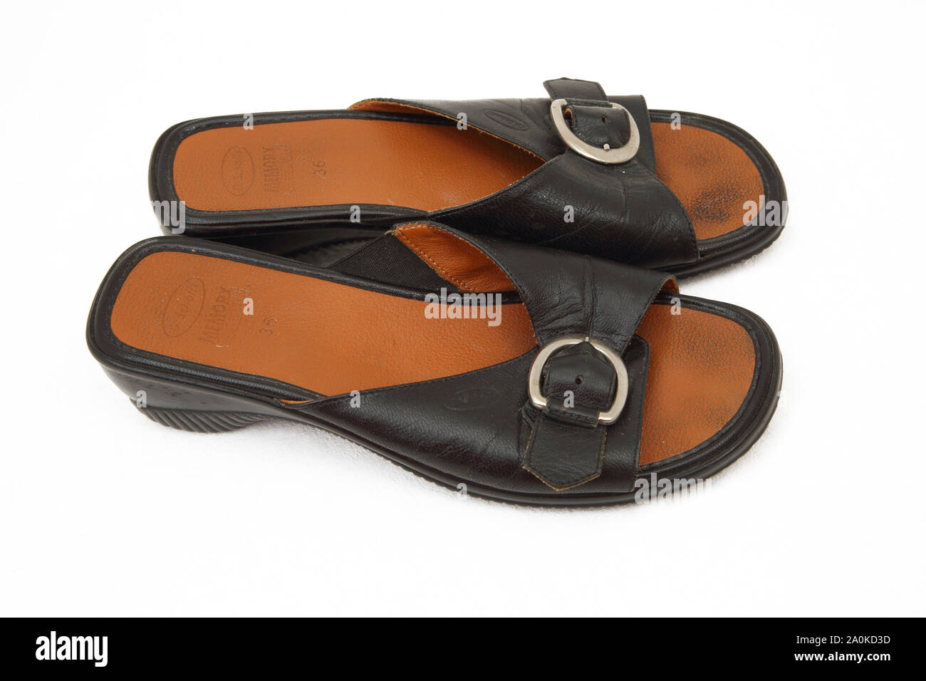 A Pair of Black Leather Scholl Slip On Sandals with Buckle and Memory Cushion  Sole Stock Photo - Alamy