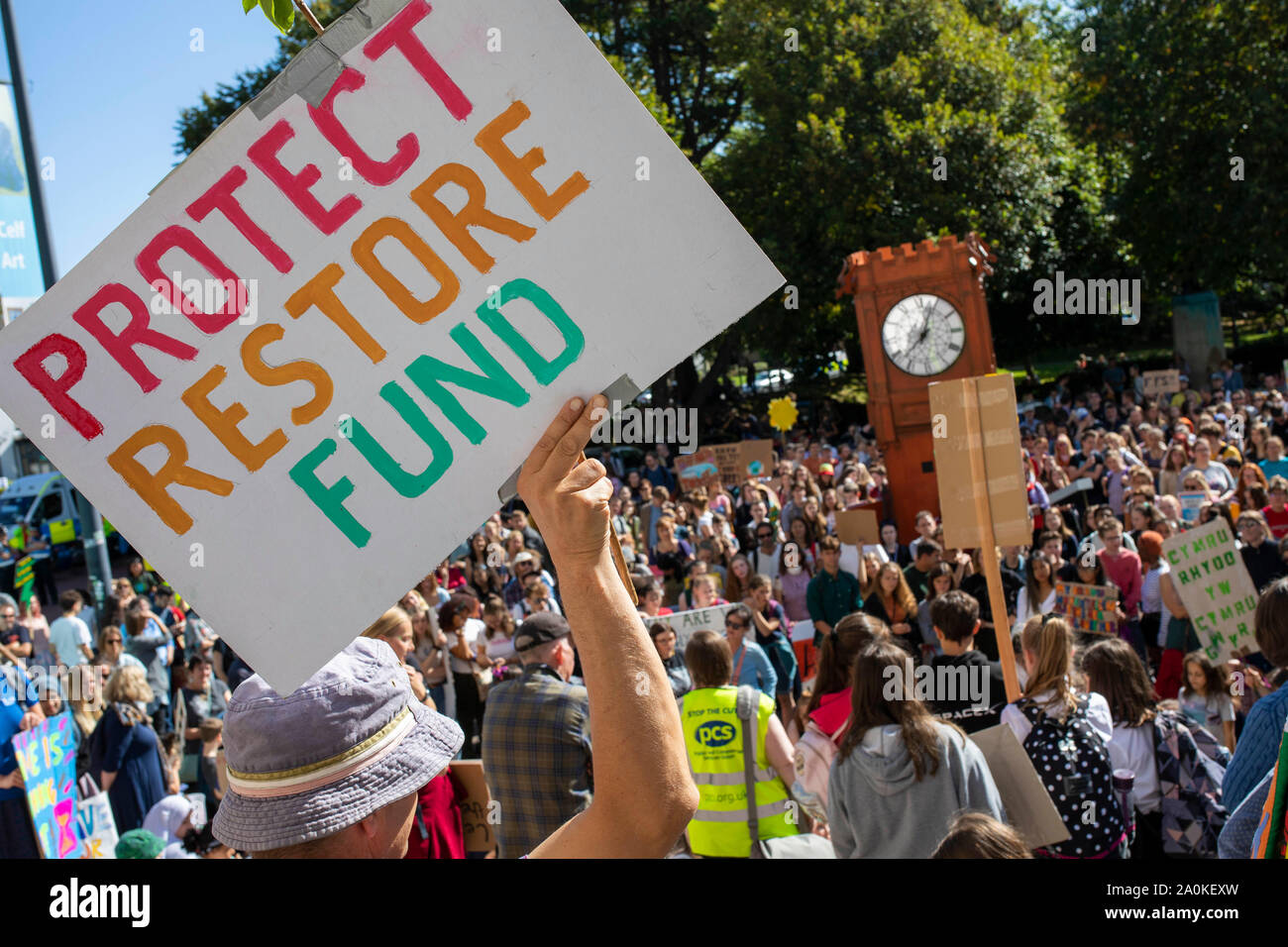 A placard quoting a short film by Greta Thunberg and George Monbiot during a protest in Cardiff demanding action on climate change, part of a global y Stock Photo