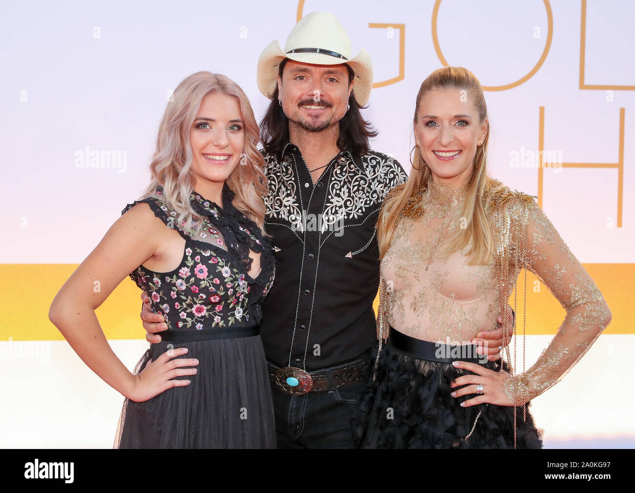 Leipzig, Germany. 20th Sep, 2019. Singer Stefanie Hertel (r) comes with her husband Lanny Lanner and her daughter Johanna to the television gala 'Goldene Henne'. A total of 53 nominees from show business, society and sport can hope for the award. The Golden Hen is dedicated to the GDR entertainer Hahnemann, who died in 1991. Credit: Jan Woitas/dpa-Zentralbild/dpa/Alamy Live News Stock Photo