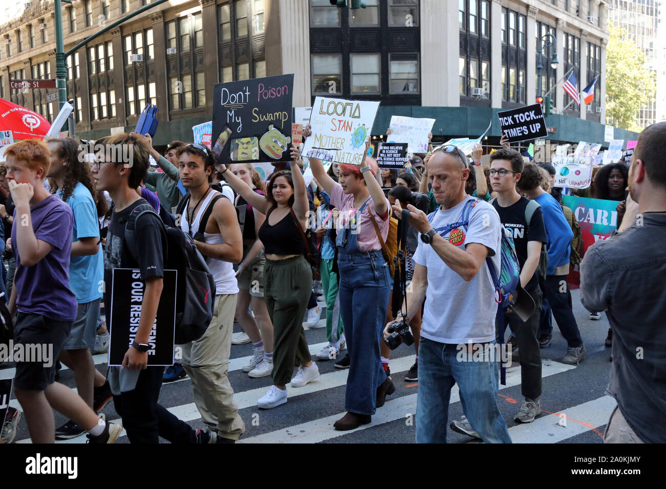 New York City, New York, USA. 20th Sep, 2019. Large crowd of students numbering in the tens of thousands joined others climate concern activists globally on 20 Sep, 2019, in Foley Square, Manhattan for a rally and march to Battery Park in Lower Manhattan in a Climate Strike inspired by Swedish climate activist Greta Thunberg, who addressed the large gathering. Credit: G. Ronald Lopez/ZUMA Wire/Alamy Live News Stock Photo
