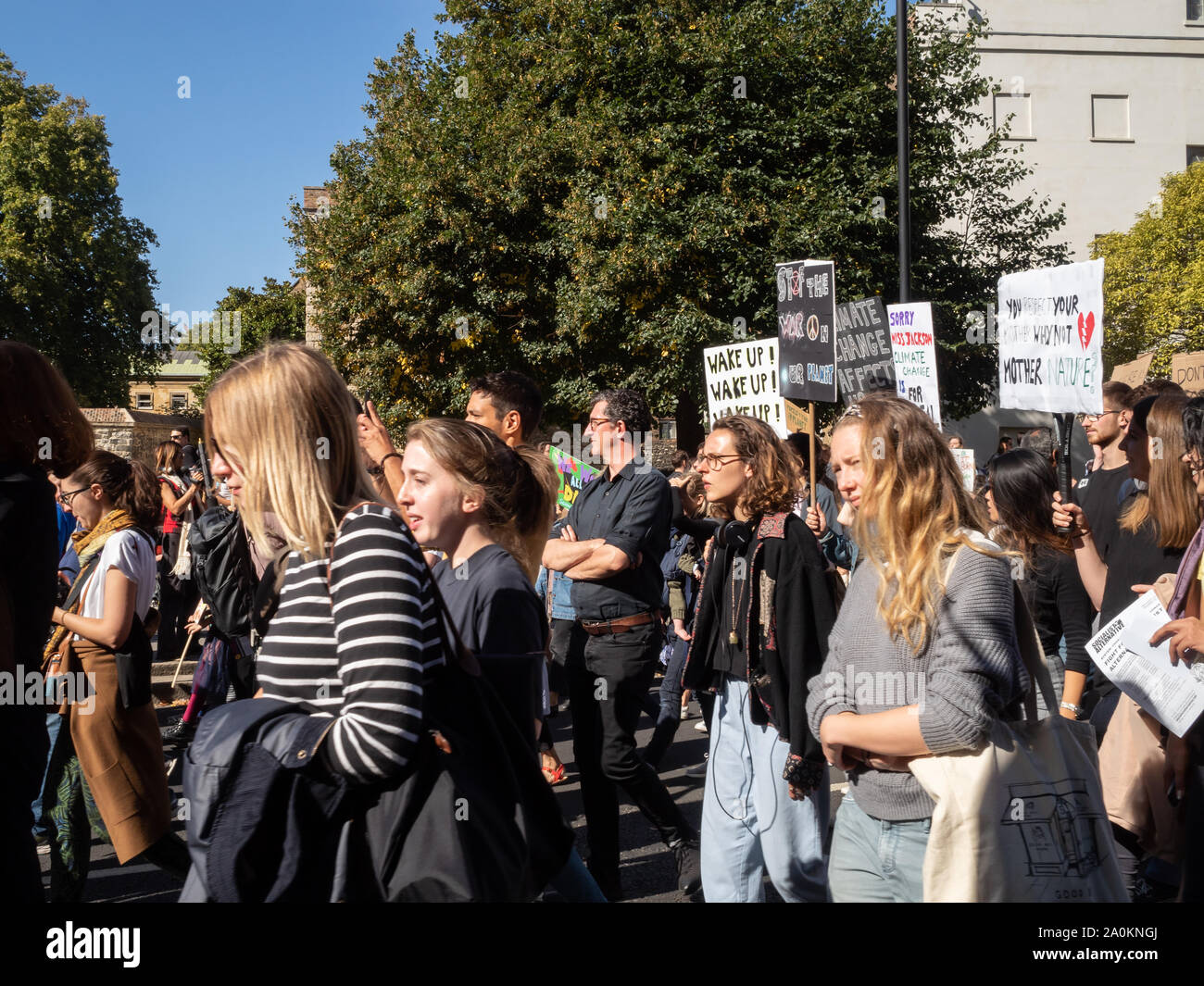 LONDON, UK - SEPTEMBER 20 2019: Crowd of people at the Global Climate Strike in London, holding placards Stock Photo