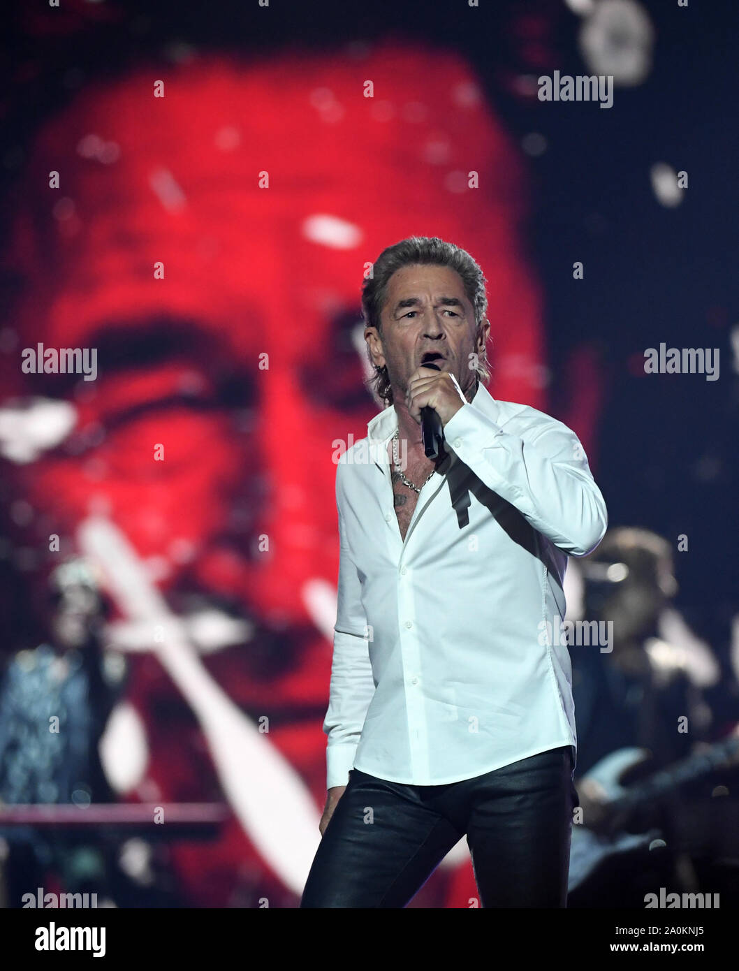 Leipzig, Germany. 20th Sep, 2019. Peter Maffay sings 'Golden Henne' during the TV gala. A total of 53 nominees from show business, society and sport can hope for the award. The Golden Hen is dedicated to the GDR entertainer Hahnemann, who died in 1991. Credit: Hendrik Schmidt/dpa-Zentralbild/dpa/Alamy Live News Stock Photo