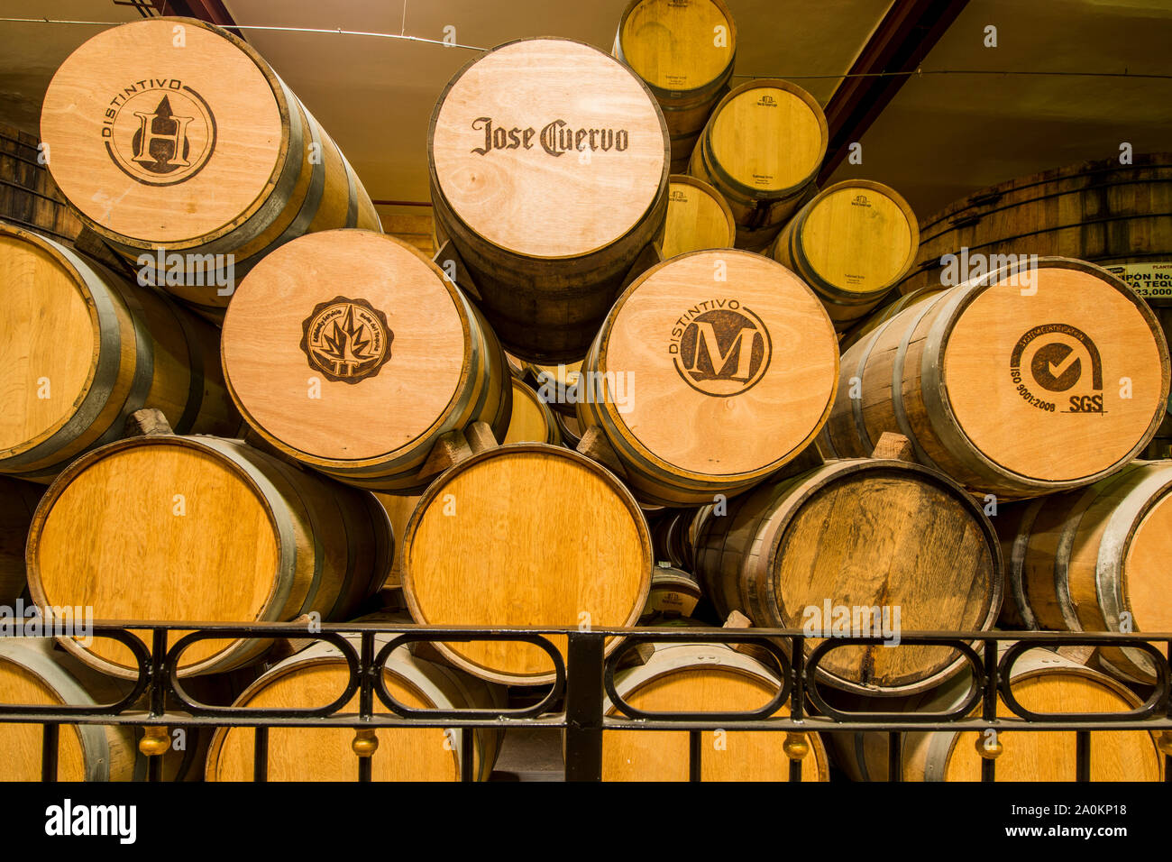 Wooden casks at Jose Cuervo La Rojena Tequila distillery cellar, Tequila, UNESCO World Heritage Site, Jalisco, Mexico. Stock Photo