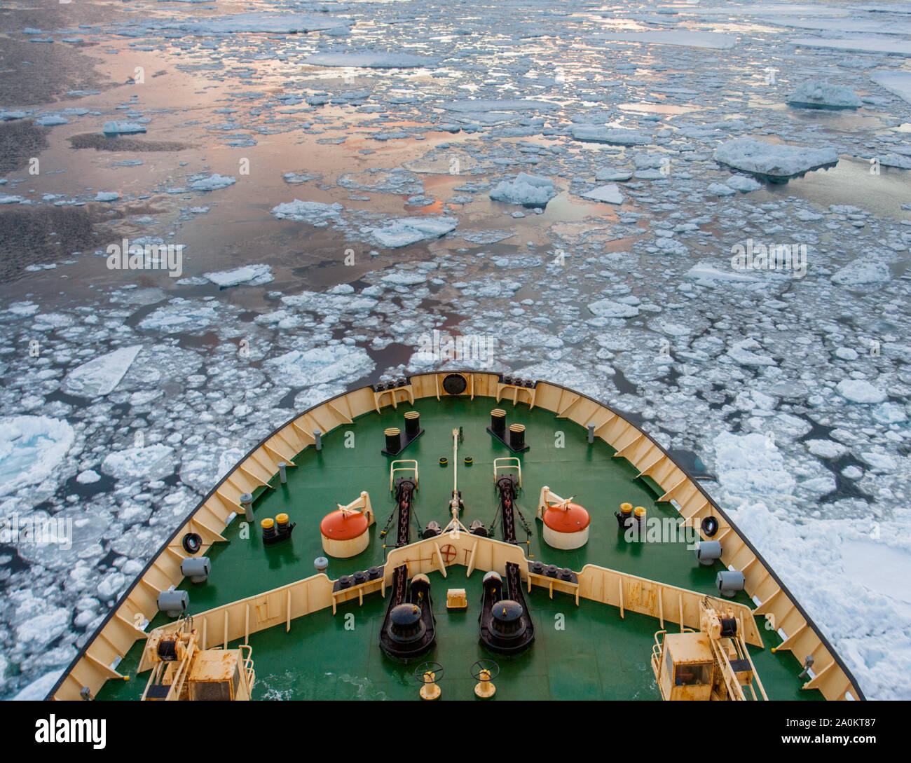 Prow of the Icebreaker Kapitan Khlebnikov cutting through sea ice and floes en route to the Weddell Sea, Antarctica Stock Photo