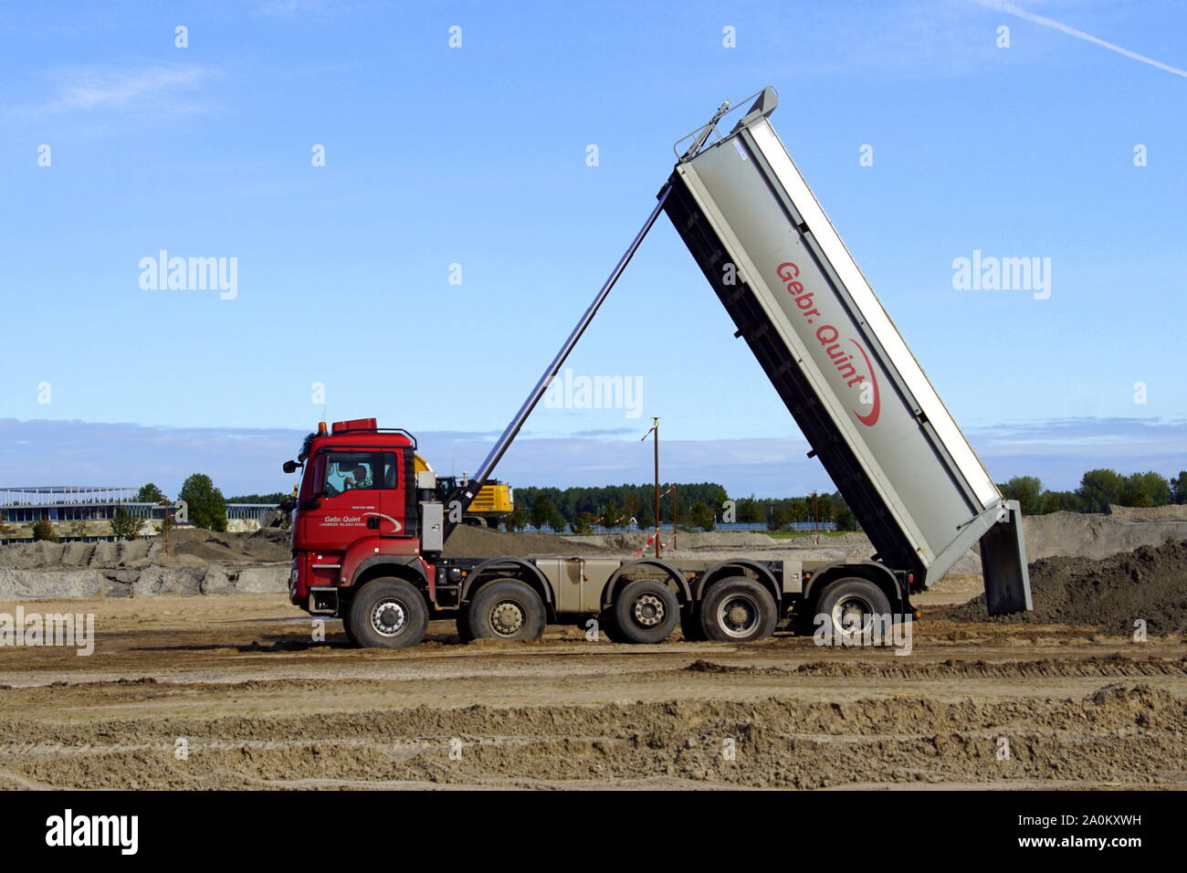 Almere Poort, the Netherland - September 20, 2019: Gebr. Quint Dump Truck on a construction site in the city of Almere. Stock Photo