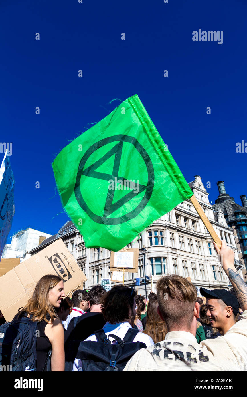 20 September 2019, London, UK - Green flag of the Extinction Rebellion at the Global Climate Strike in Westminster Stock Photo