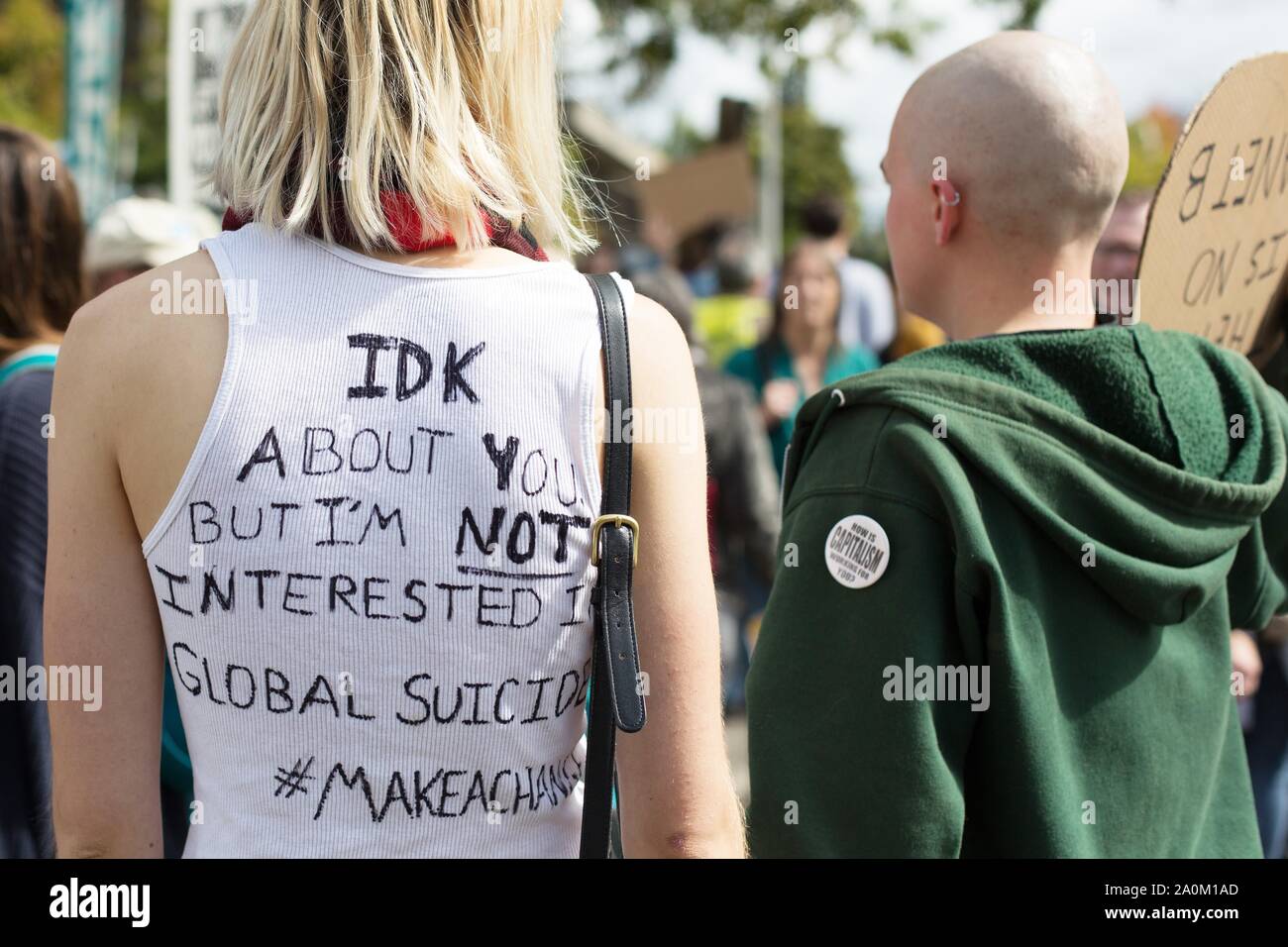 A person with a handwritten message on her shirt at the Climate Strike rally in Eugene, Oregon, USA. Stock Photo