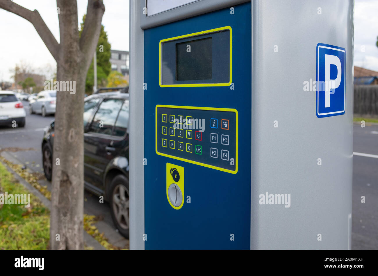 A coin operated ticket machine/pay station for roadside parking. Melbourne, VIC Australia. Stock Photo