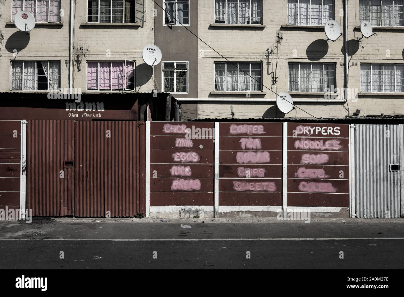 A closed mini-market shop in Cape Town's Hanover Park suburb that is affected by gangsterism driven by the illegal narcotics market Stock Photo
