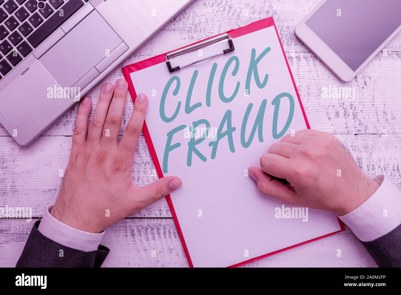 Conceptual hand writing showing Click Fraud. Concept meaning practice of repeatedly clicking on advertisement hosted website Stock Photo