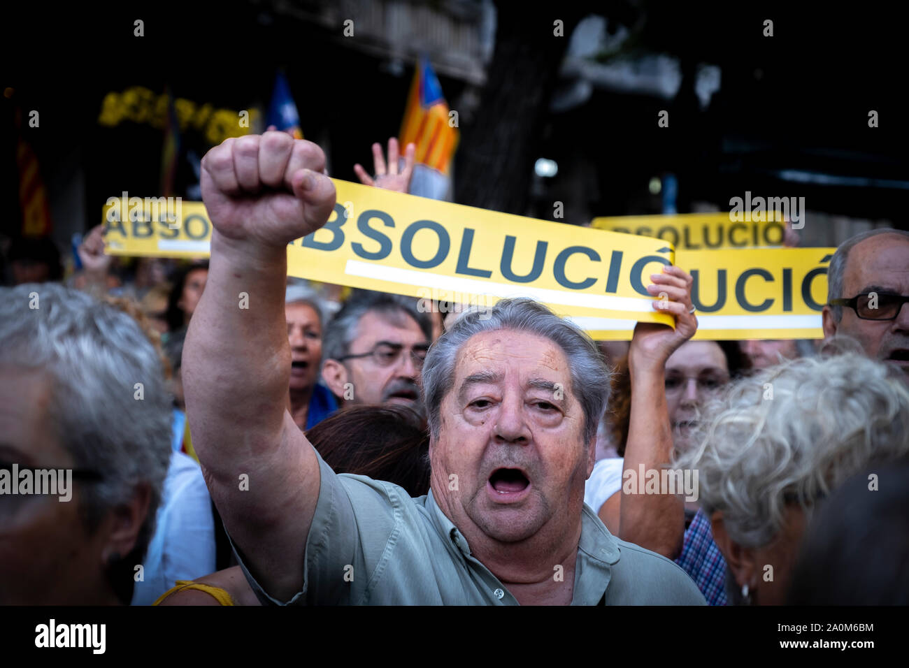 Barcelona, Spain. 20th Sep, 2019. A protester sings the Catalan national anthem with his fist raised during the demonstration.Summoned by the cultural entity 'mnium hundreds of people remember the 20-N two years ago when the Spanish Civil Guard police, registered the headquarters of the economy of Catalonia. The 20-N concentrations were part of the accusation in the trial of Catalan politicians currently in prison and still awaiting sentencing. Credit: SOPA Images Limited/Alamy Live News Stock Photo