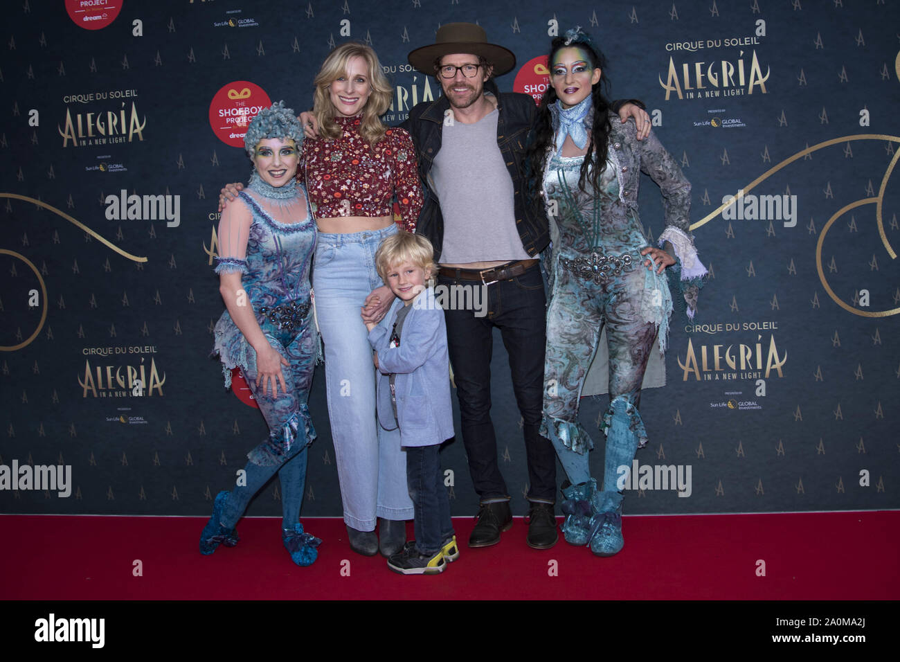 September 19, 2019, Toronto, Ontario, Canada: Canadian folk rock singers  Melissa McClelland and Luke Doucet and their child Chloe Doucet attending  the red carpet premiere of Cirque du Soleil most iconic production,