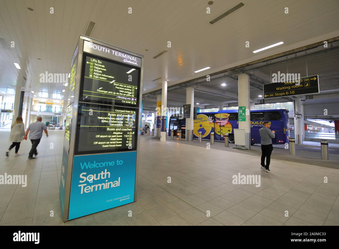 People travel at Gatwick airport bus terminal London England Stock Photo -  Alamy