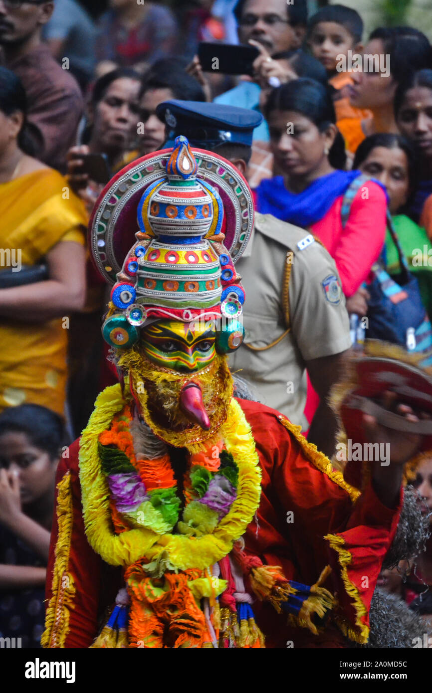 Kathakali artists in Onam procession, Kerala, India Stock Photo