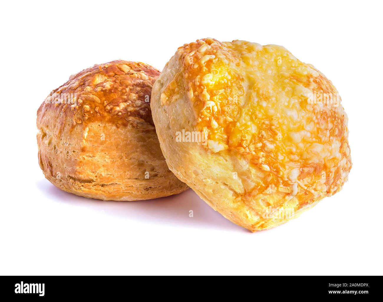 attractive airy puff pastry buns baked under cheese Stock Photo