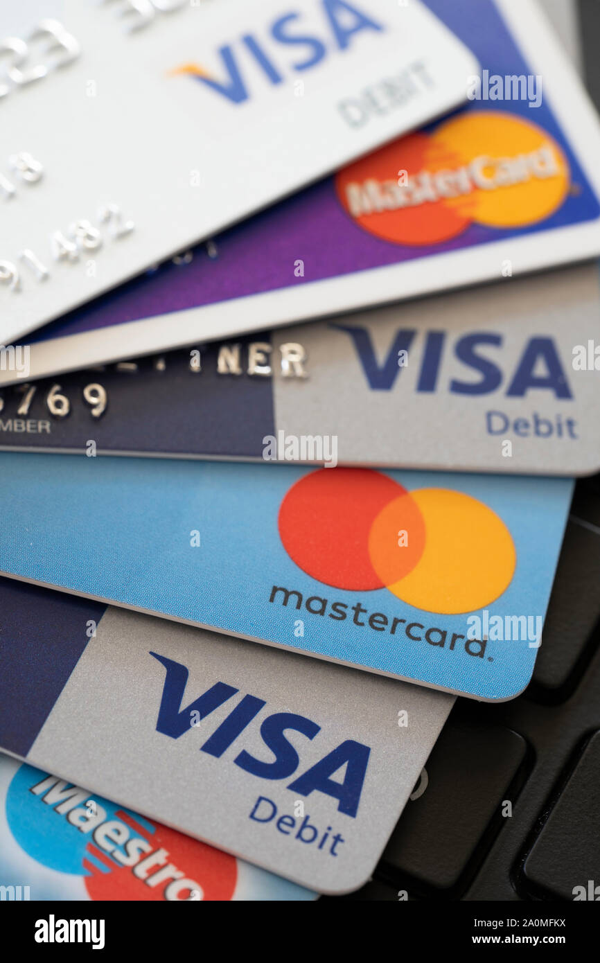 Debit Visa and Mastercard credit cards showing the concepts of finances