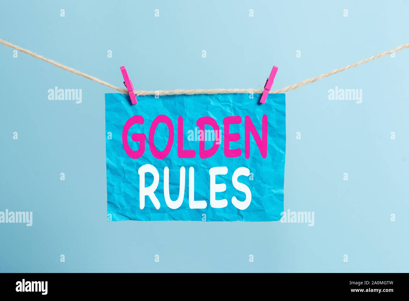 Writing note showing Golden Rules. Business concept for Basic principle
