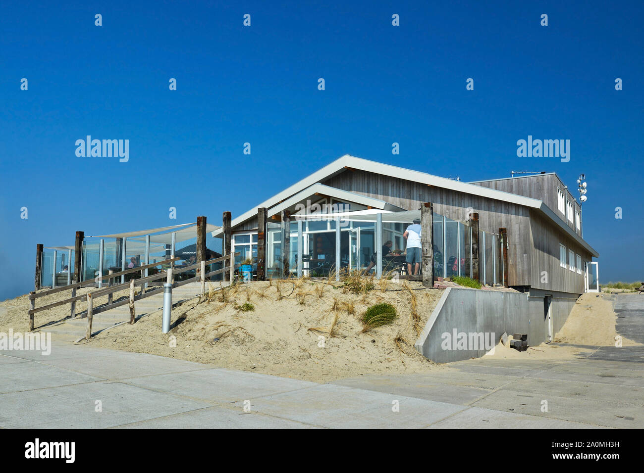 Texel, Netherlands - August 2019: Small beautiful wooden beach pavillon called 'Paal 9' on a summer day on island Texel in Netherlands Stock Photo