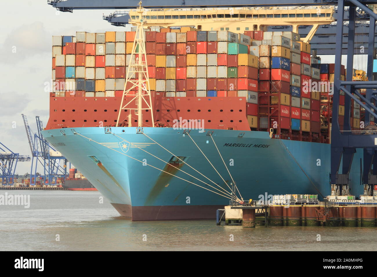 Shipping containers and cargo loaded onto a vessel at the British Port ...