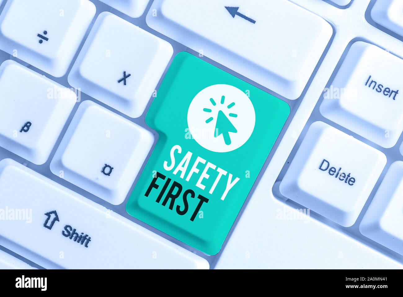 Writing note showing Safety First. Business concept for Avoid any unnecessary risk Live Safely Be Careful Pay attention White pc keyboard with note pa Stock Photo