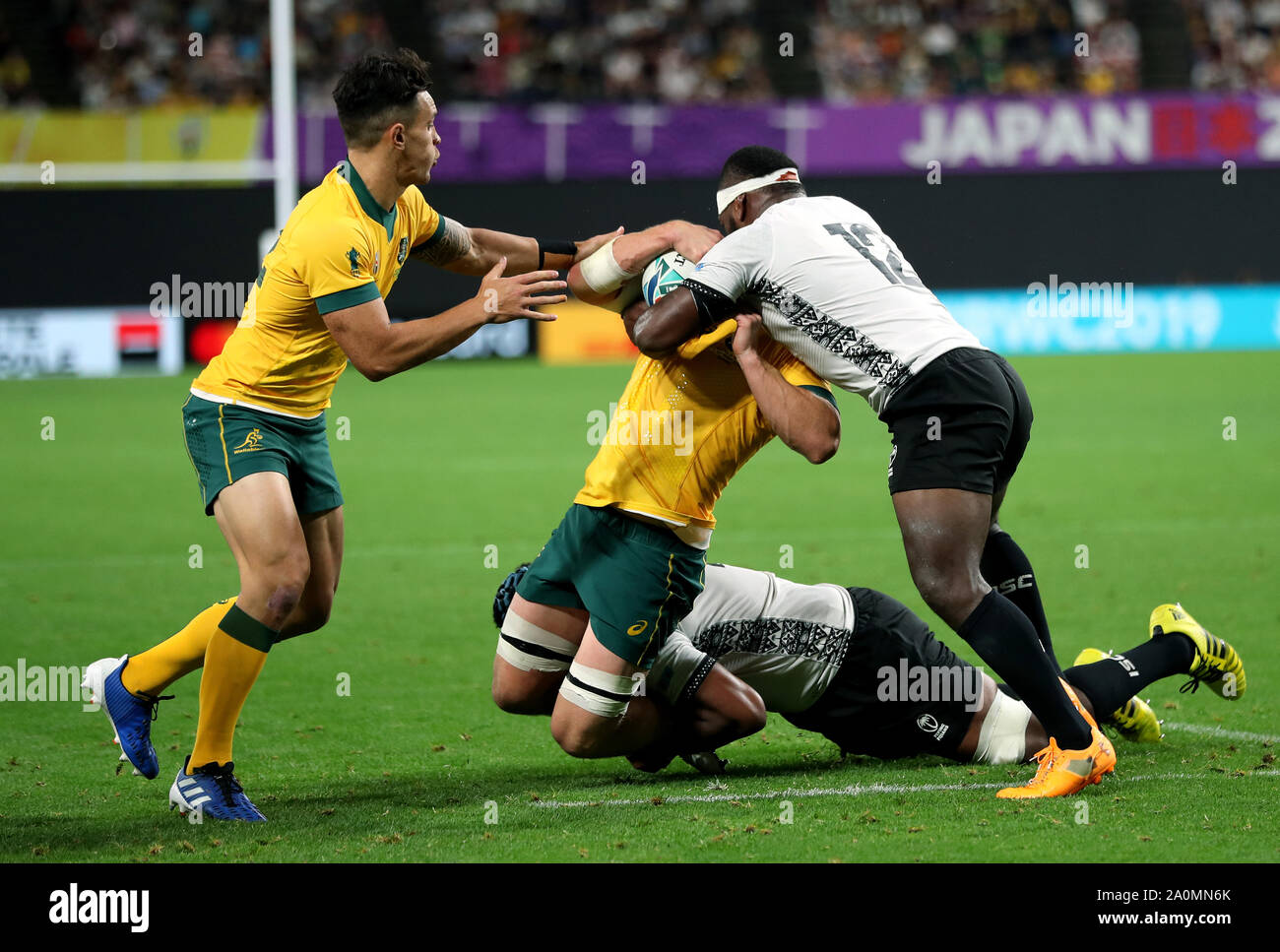 Fiji's Levani Botia (right) tackles Australia's Michael Hooper resulting in a yellow card during the 2019 Rugby World Cup Pool D match at Sapporo Dome. Stock Photo