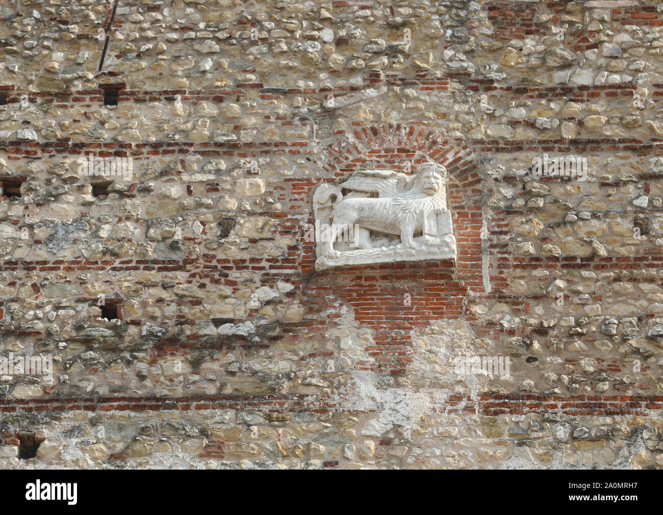 Winged Lion symbol of Repubblica Serenissima of Venice on the wall in Italy Stock Photo