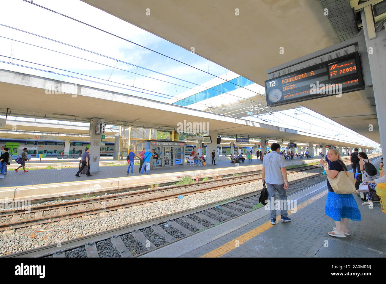 People travel at Rome Ostiense train station Rome Italy Stock Photo