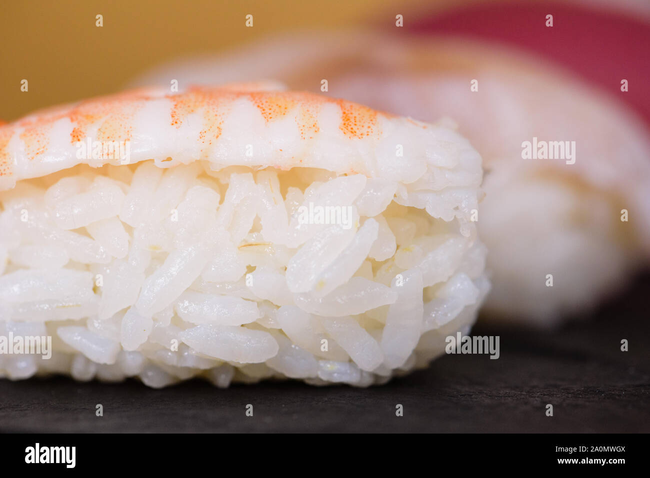 details of a shrimp nigiri, other nigiri on background, macro details Stock Photo