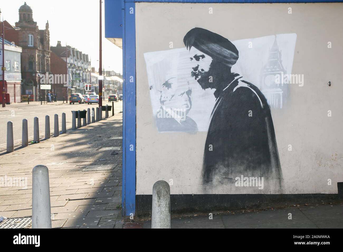 Tanmanjeet Singh Dhesi appears in a street graffiti mural, Soho Road, Handsworth, Birmingham, UK. The mural depicts the altercation Tan Dhesi had with PM Boris Johnson Sept 2019 in the House of Commons Stock Photo