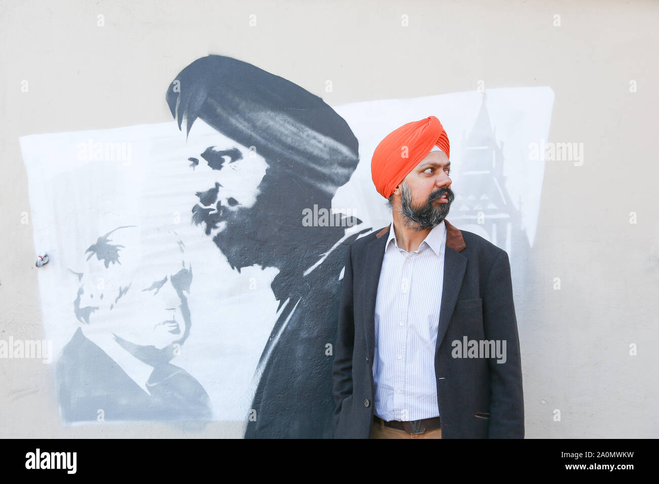 Tanmanjeet Singh Dhesi appears in a street graffiti mural, Soho Road, Handsworth, Birmingham, UK. The mural depicts the altercation Tan Dhesi had with PM Boris Johnson Sept 2019 in the House of Commons Stock Photo