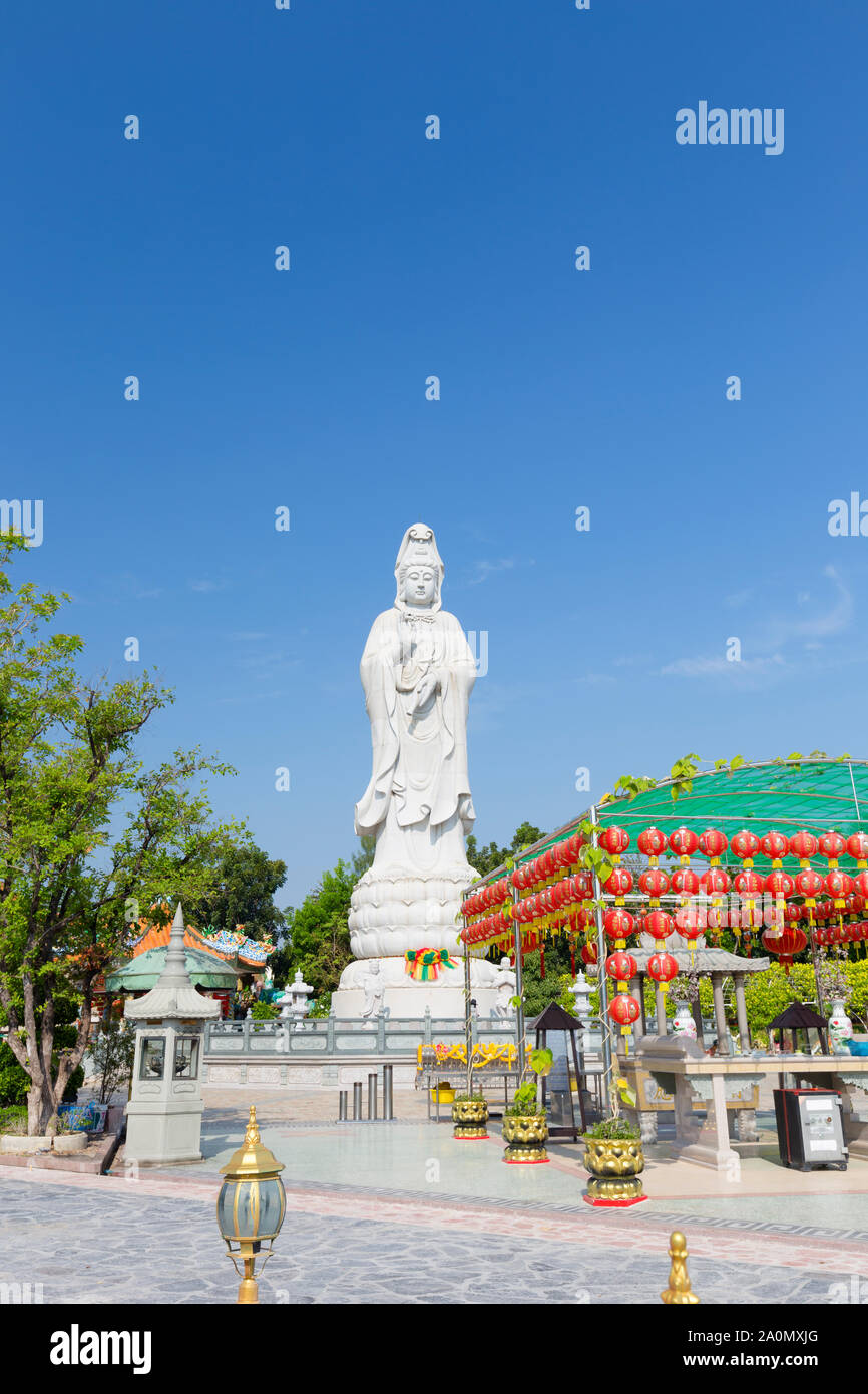 Guan Yin statue at riverside of the River Kwai in Kanchanaburi, Thailand Stock Photo