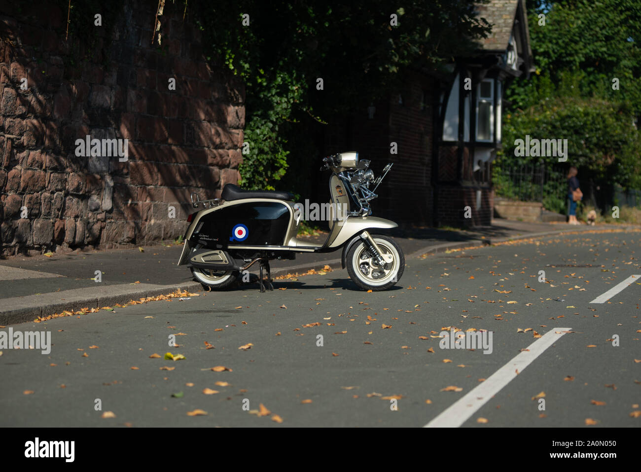A Scomadi scooter parked on The Groves, a residential area at the side of the River Dee, Chester, Cheshire, UK. Stock Photo