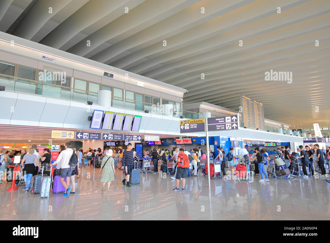 People travel at Leonardo da Vinci Fiumicino airport Rome Italy Stock Photo