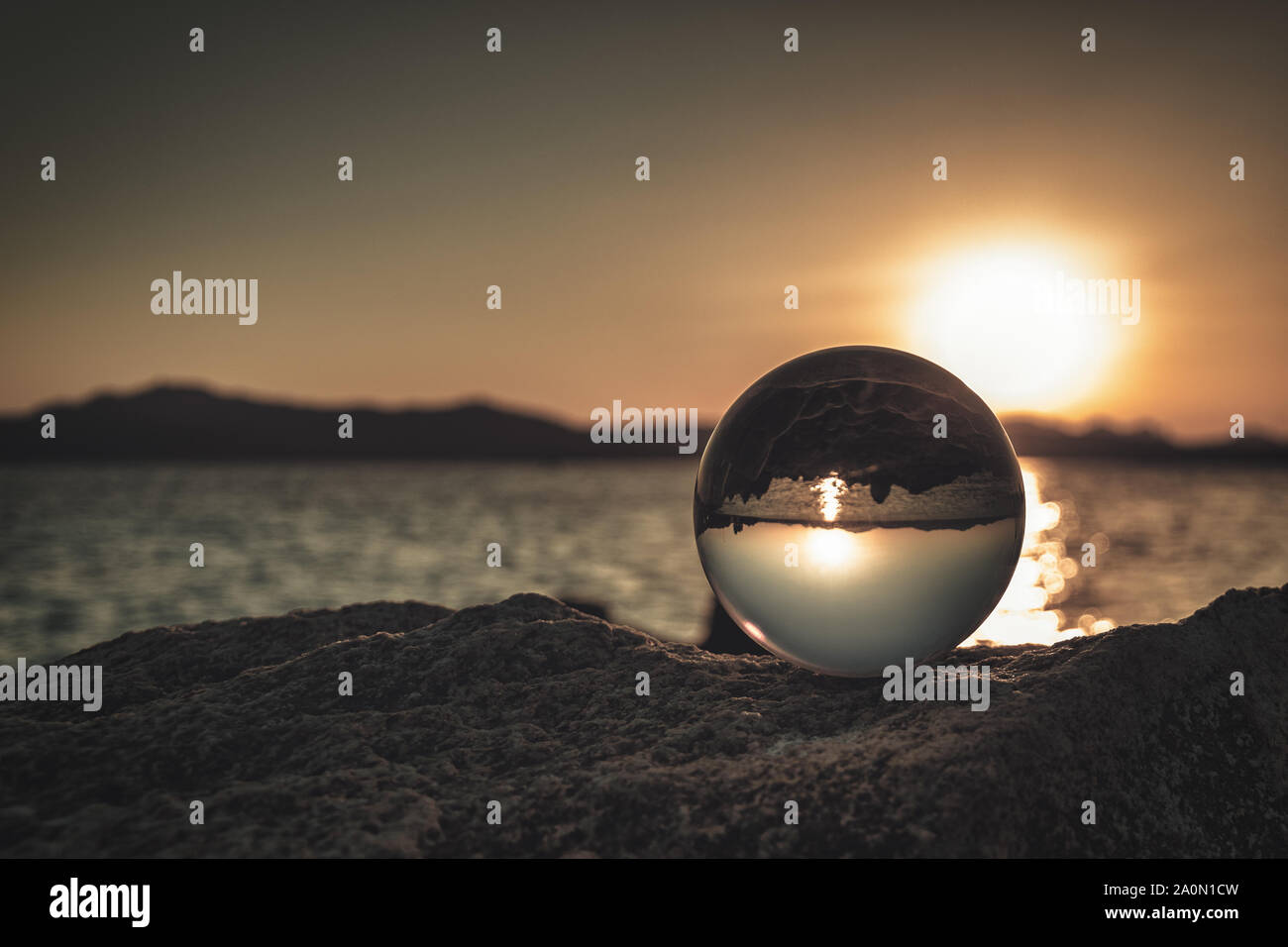 Crystal ball in golden sunset hi-res stock photography and images - Alamy