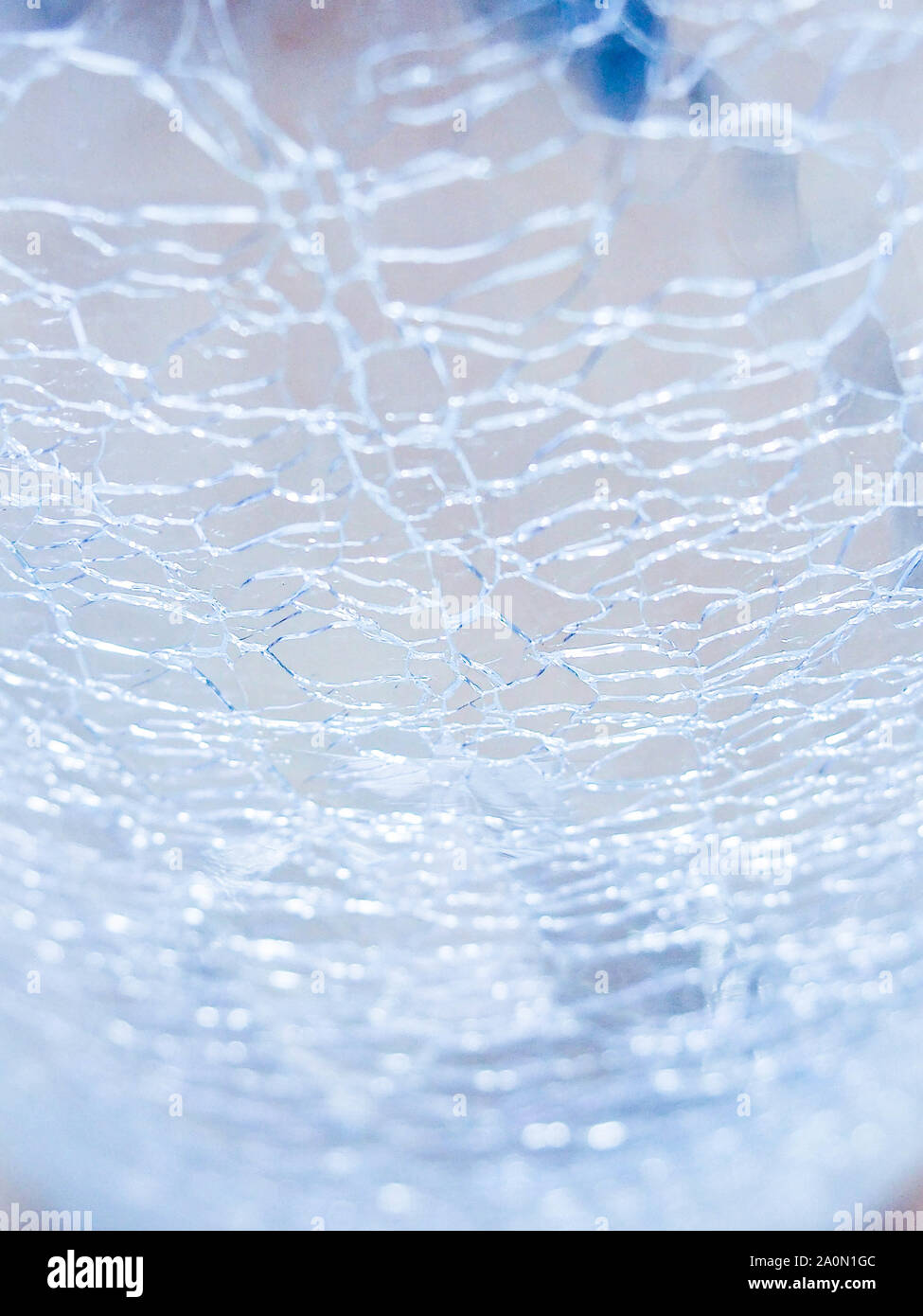 Abstract - Cracked Glass, texture small cracks on the glass Stock Photo