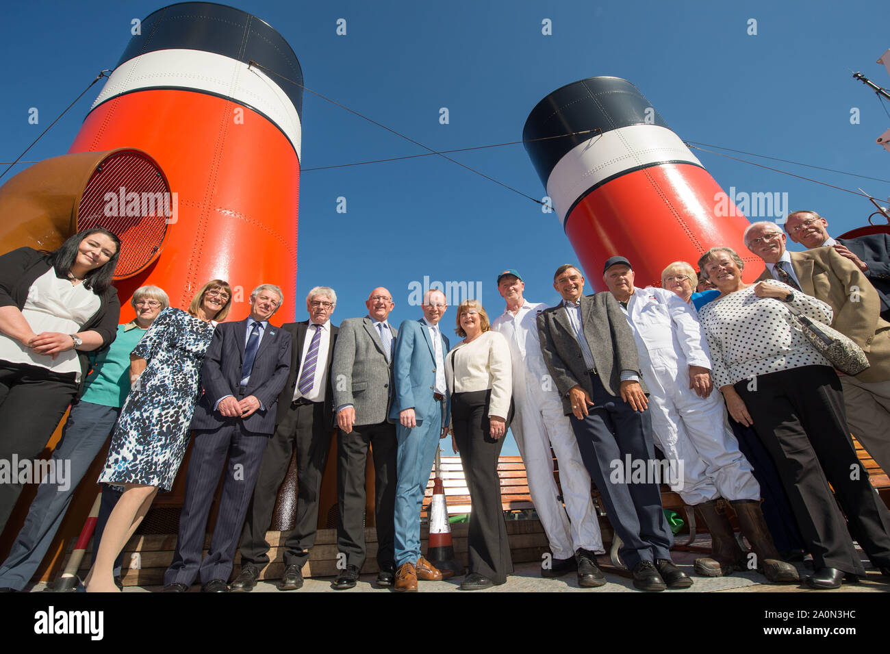 Glasgow, UK. 21 September 2019. PICTURED: (L-R) Lucy Morley; Margaret Skee; Helen Ellis; Deryk Ellis; Alasdair MacMillan; Cameron Marshall; Paul Semple; Fiona Hyslop MSP; John McTavish; Derek Peters; Jim Whitelaw; Heather Reid; Elizabeth Wilson; Peter Reid; Gordon Wilson.  Ms Hyslop said: “The Waverley has delighted generations of locals and visitors throughout its 70-year history and I am pleased to be able to announce this significant financial commitment to help the historic paddle steamer set sail once again. Credit: Colin Fisher/Alamy Live News Stock Photo