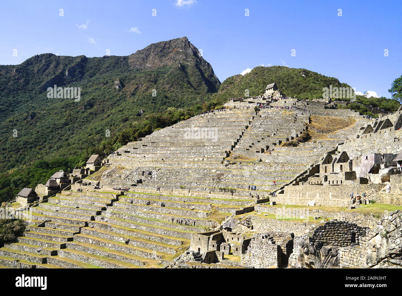 Machu Picchu is an Incan citadel set high in the Andes Mountains in Peru, above the Urubamba River valley. Built in the 15th century and later abandoned, it’s renowned for its sophisticated dry-stone walls that fuse huge blocks without the use of mortar, intriguing buildings that play on astronomical alignments and panoramic views. Its exact former use remains a mystery. It stands 7,970 feet (2,430 meters) above sea level on the eastern slope of the Andes Stock Photo