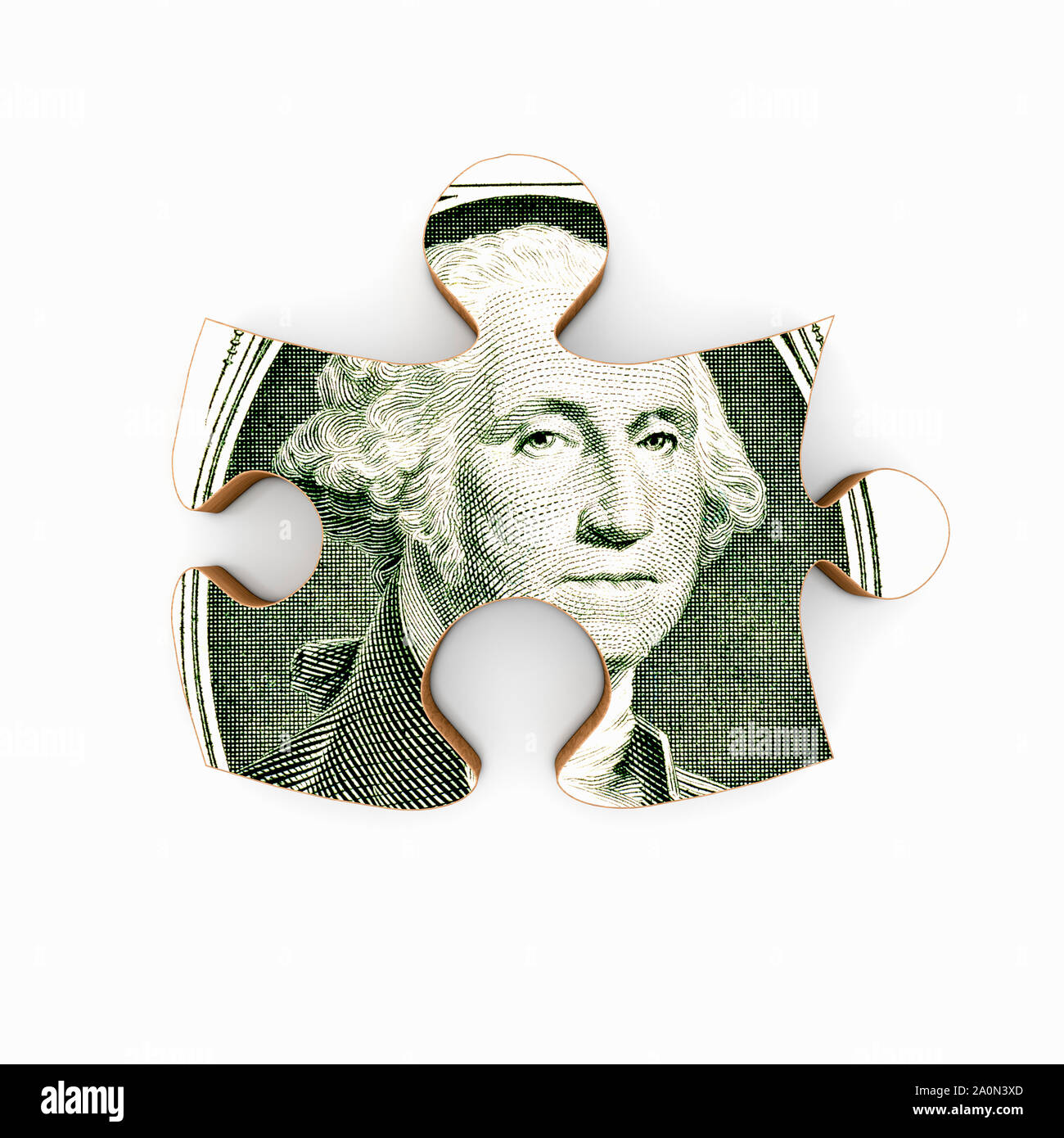 Dollar bill on a jigsaw puzzle piece Stock Photo