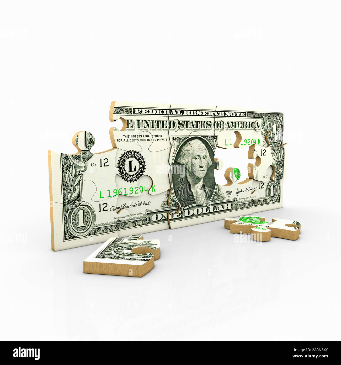 Dollar bill on a jigsaw puzzle Stock Photo