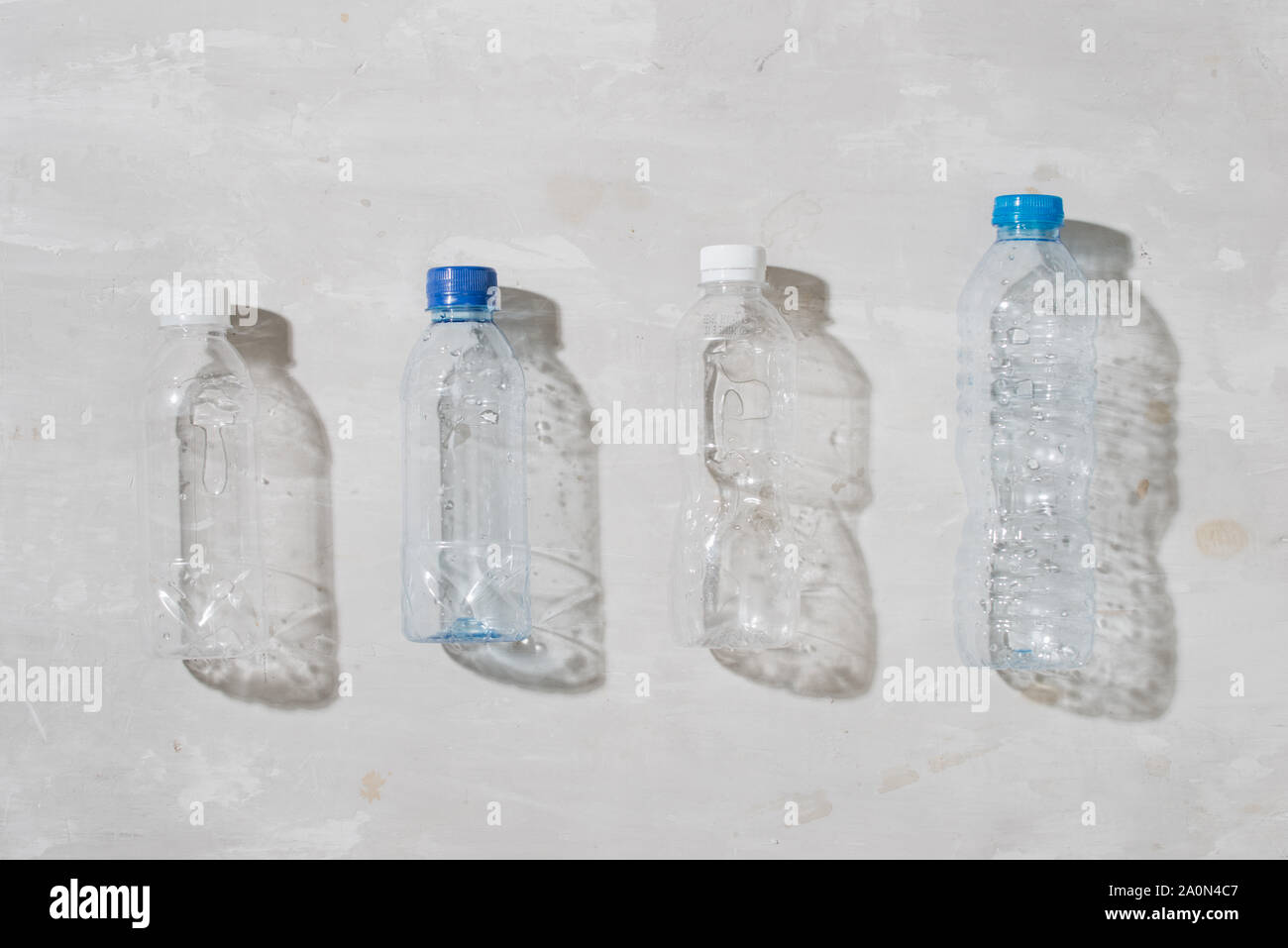 close up of used plastic bottles on white background Stock Photo