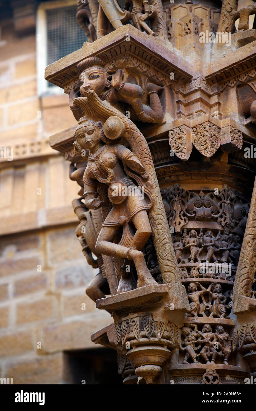 Bracket design with divine dancer on the columns of Shri Mahaveer Jain temple at Jaisalmer Fort, Jaisalmer, Rajasthan, India Stock Photo