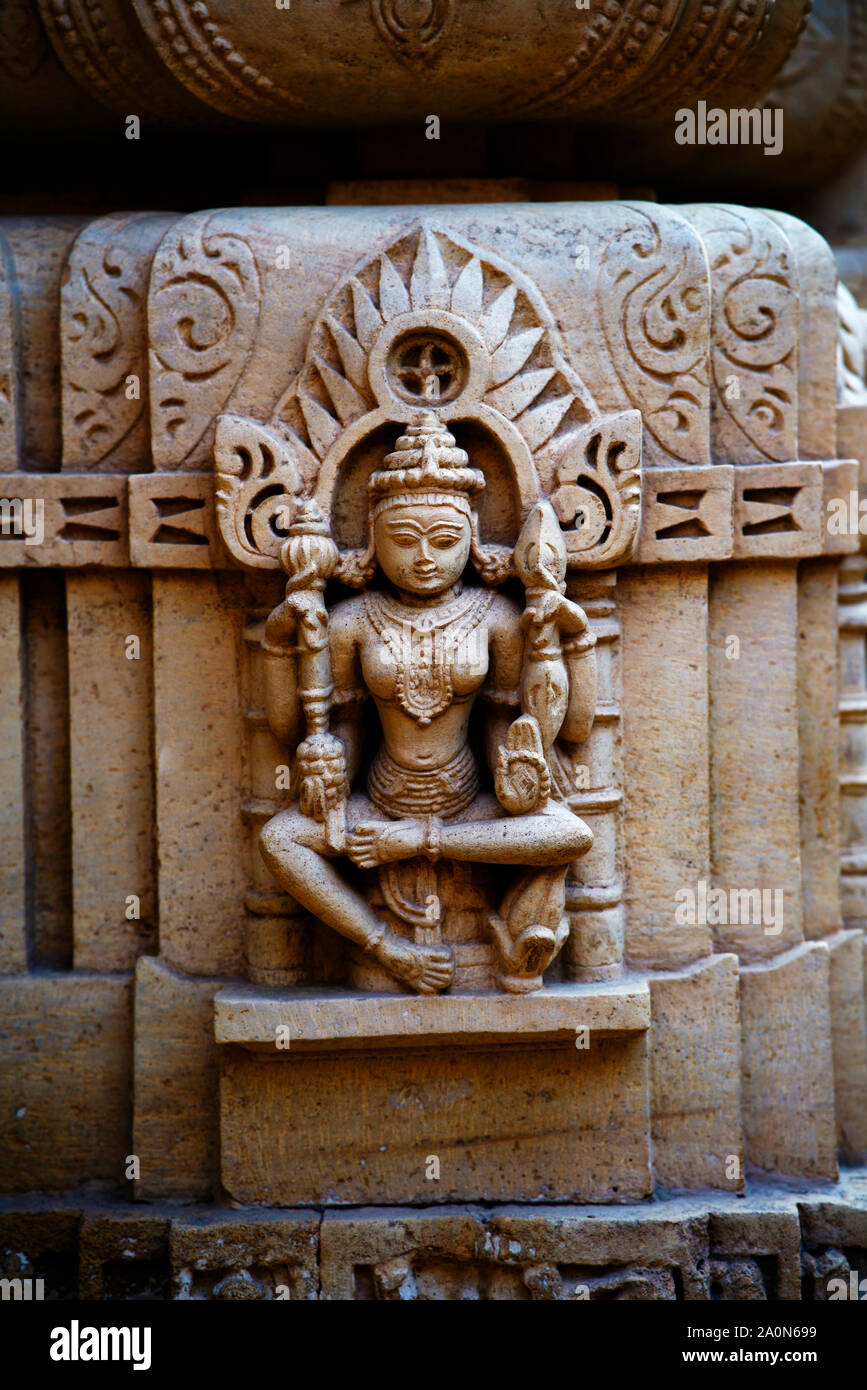 Column pedestal with devine female figure at Shri Mahaveer Jain Temple at Jaisalmer Fort, Jaisalmer, Rajasthan, India Stock Photo