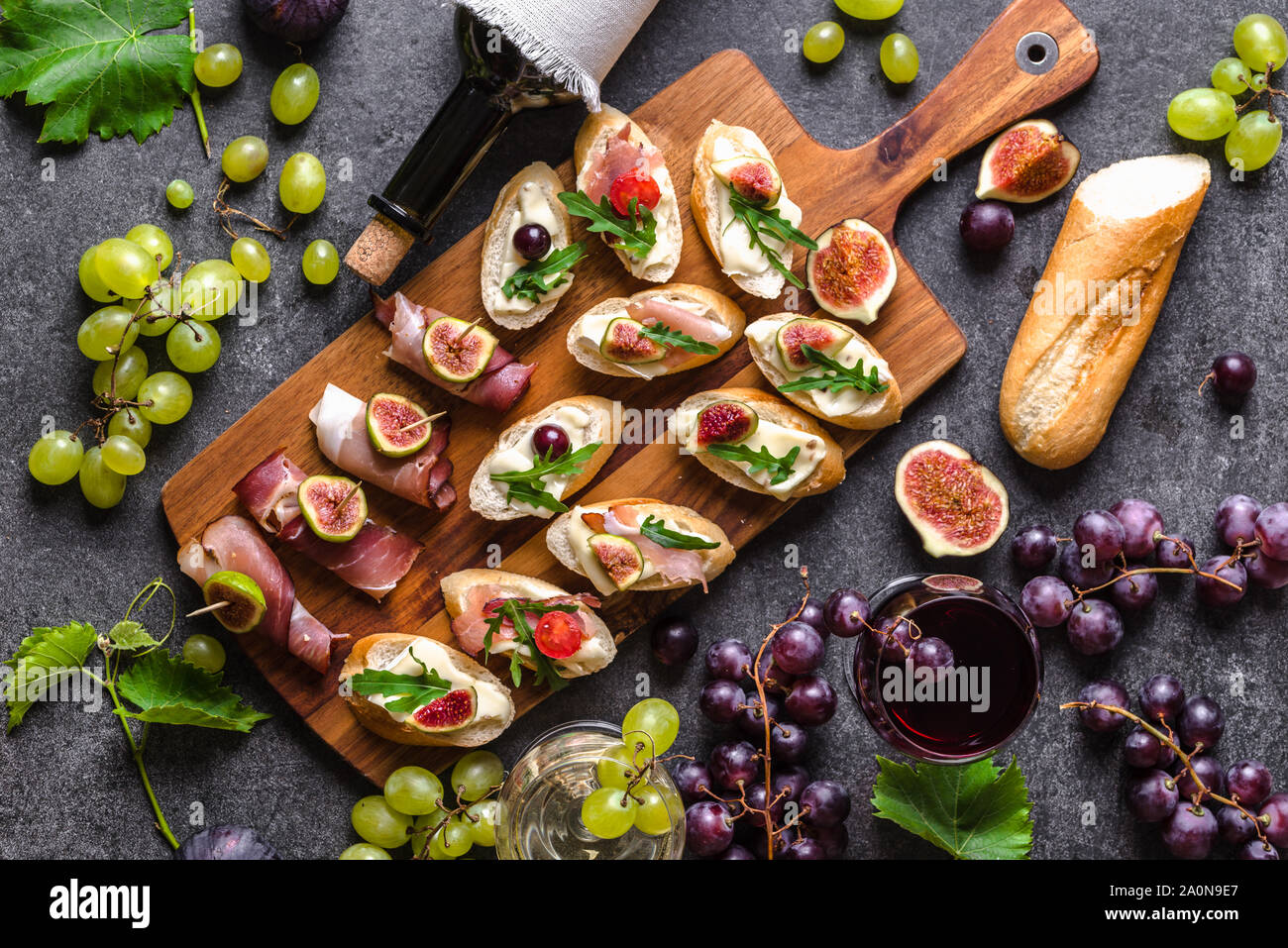 Traditional tapas bar, spanish table with food, platter with appetizers