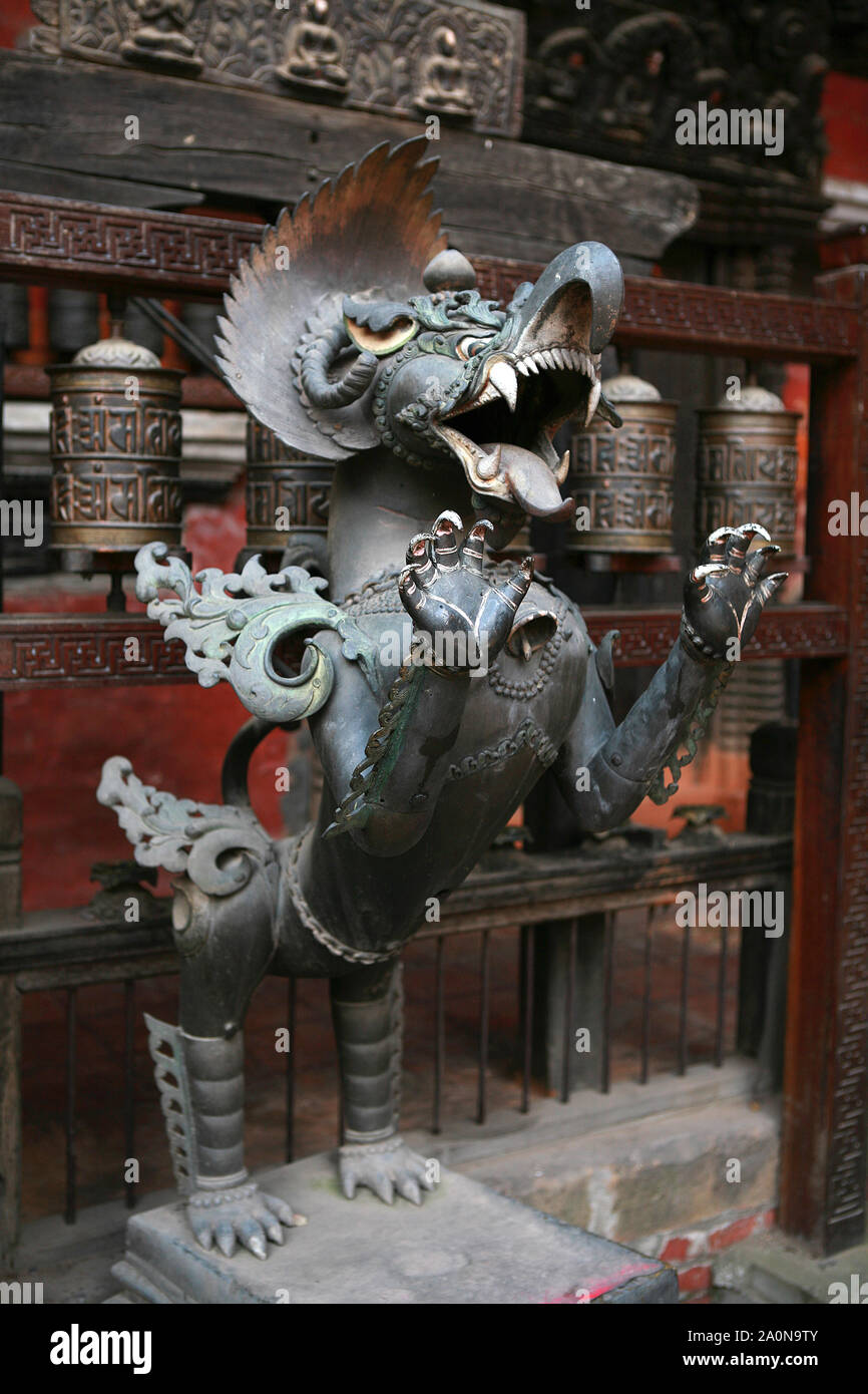 KATHMANDU, NEPAL. 23 September 2008: Lion belching fire. Rudra Varna Mahavihar, unique golden buddhist temple in Lalitpur, Patan. World heritage site. Stock Photo