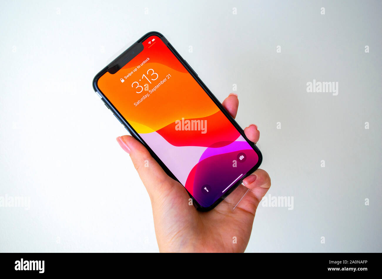 Dubai / UAE - September 21, 2019: iphone 11 pro. Iphone 11 pro. Front side of Apple Iphone 11 Pro in hand on light background. Stock Photo