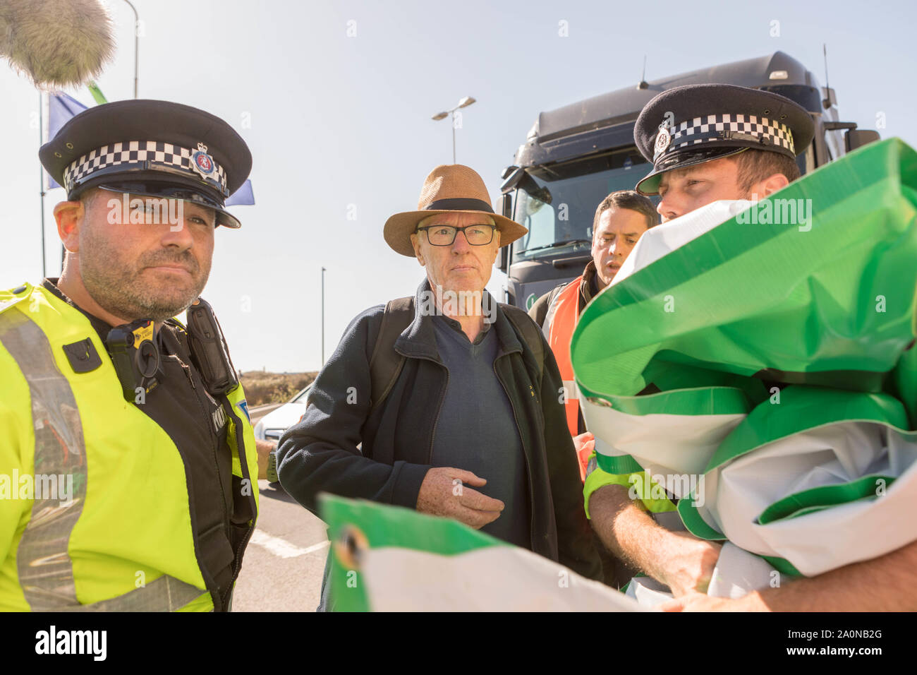 Port of Dover, Kent, UK. 21st Sept, 2019. Environmental group Extinction Rebellion supporters block roads around the Port of Dover. The Dover road block is to highlight the extreme vulnerability of the British people to food insecurity and underline the need for the Government to take emergency action on the climate and ecological crisis. Penelope Barritt/Alamy Live News Stock Photo