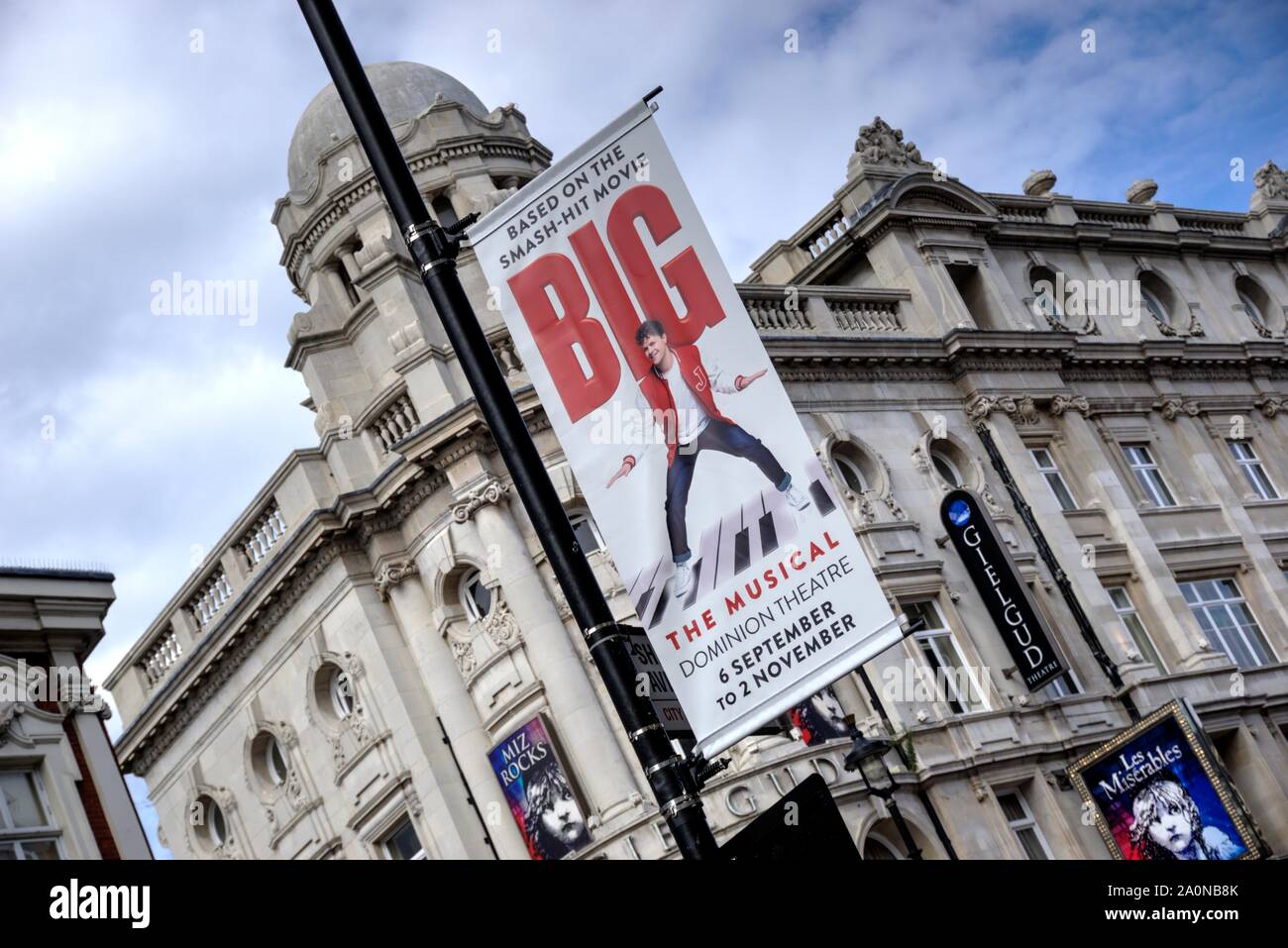London, United Kingdom - September 7, 2019: Facade of Gielgud theatre in Shaftesbury Avenue showing name signage with sign for musical 'Big' in foregr Stock Photo