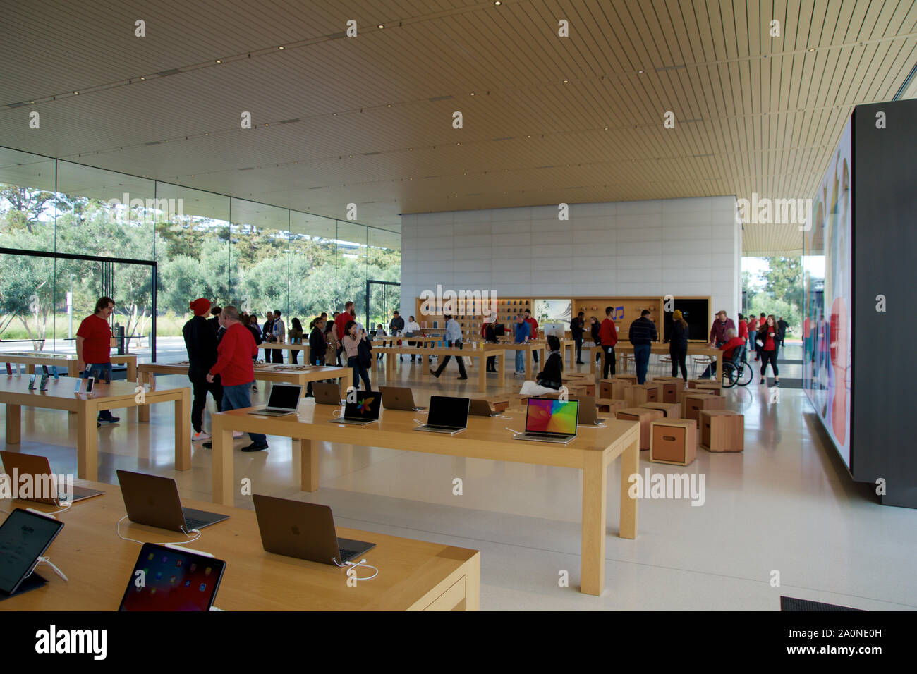 CUPERTINO, CALIFORNIA, UNITED STATES - NOV 26th, 2018: Interior with many customers in the new Apple store and Headquarters of Apple Park Visitor Stock Photo