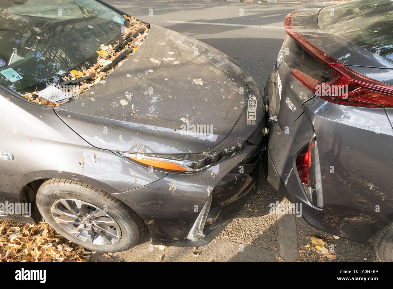 Paris, France - Sept 01, 2019: Closely parked, abandoned Autolib cars in a street of Paris, France. Autolib' was an electric car sharing service which Stock Photo