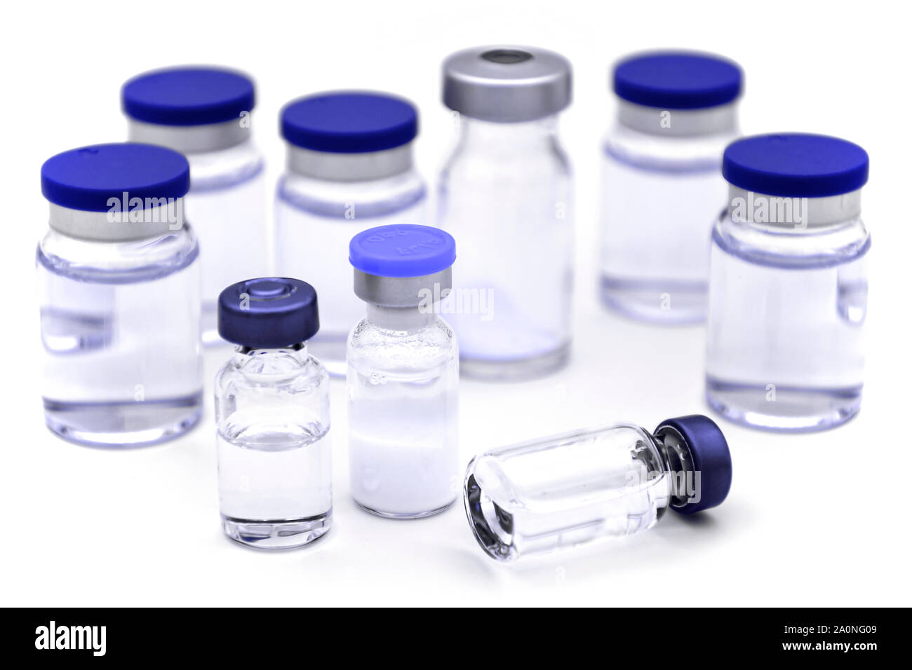 Vials of sterile pharmaceutical products for injection on white background. Stock Photo